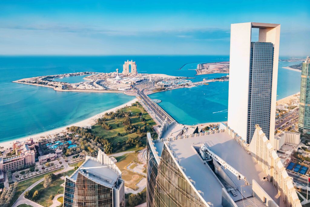 From above, the intricate architectural details of Abu Dhabi's skyscrapers are on full display, showcasing the city's unique blend of modern and traditional design elements.