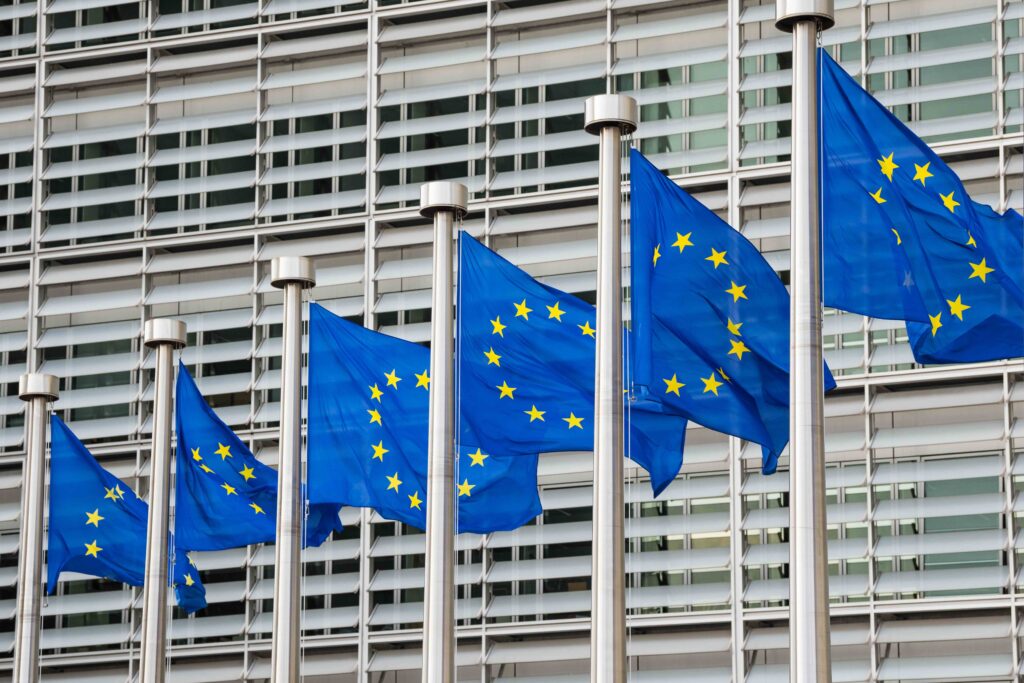 Fluttering European Union flags in a row in Brussels, Belgium. Close up