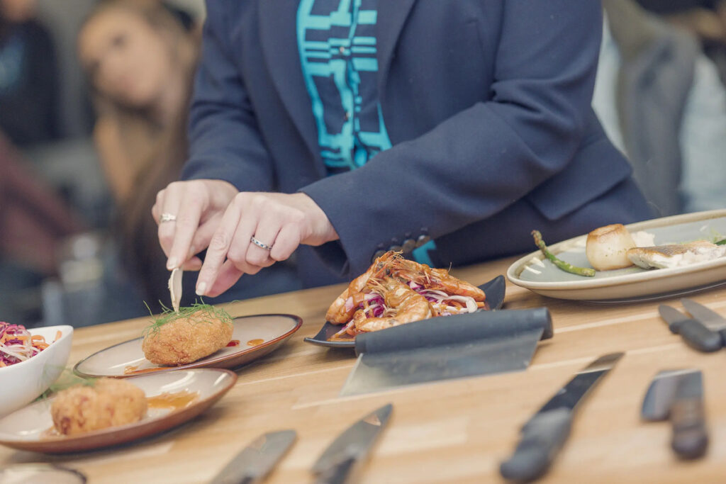 woman preparing seafood